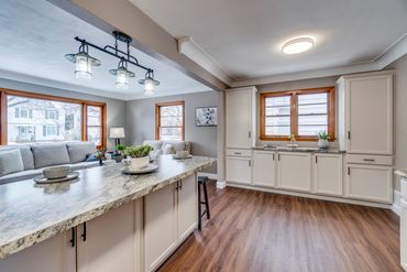 New peninsula, extra cabinets and lighting