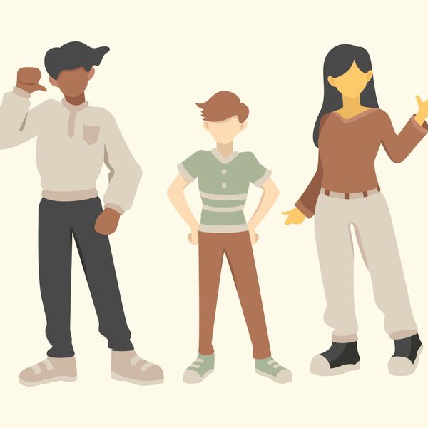 Three diverse young people standing confidently in casual clothing.