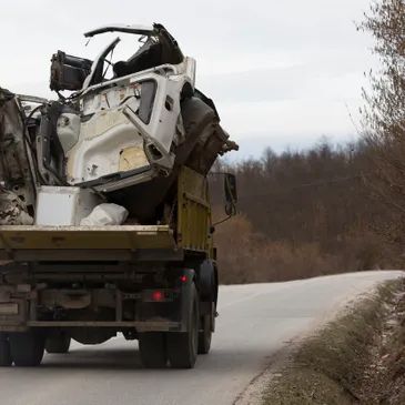 Junk Removal Truck Hauling Trash