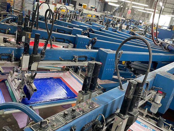 Industrial printing machine operating in modern office workspace