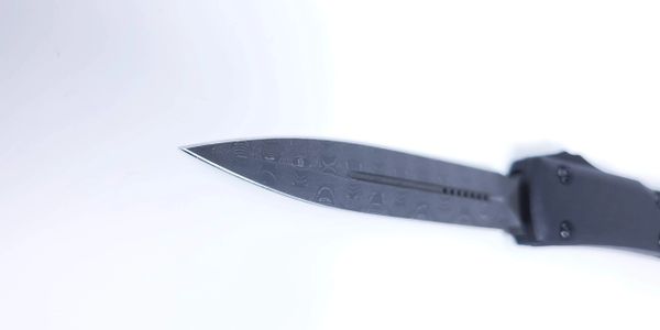 Microtech makes a fantastic damascus blade for the UTX Ultratech knife.