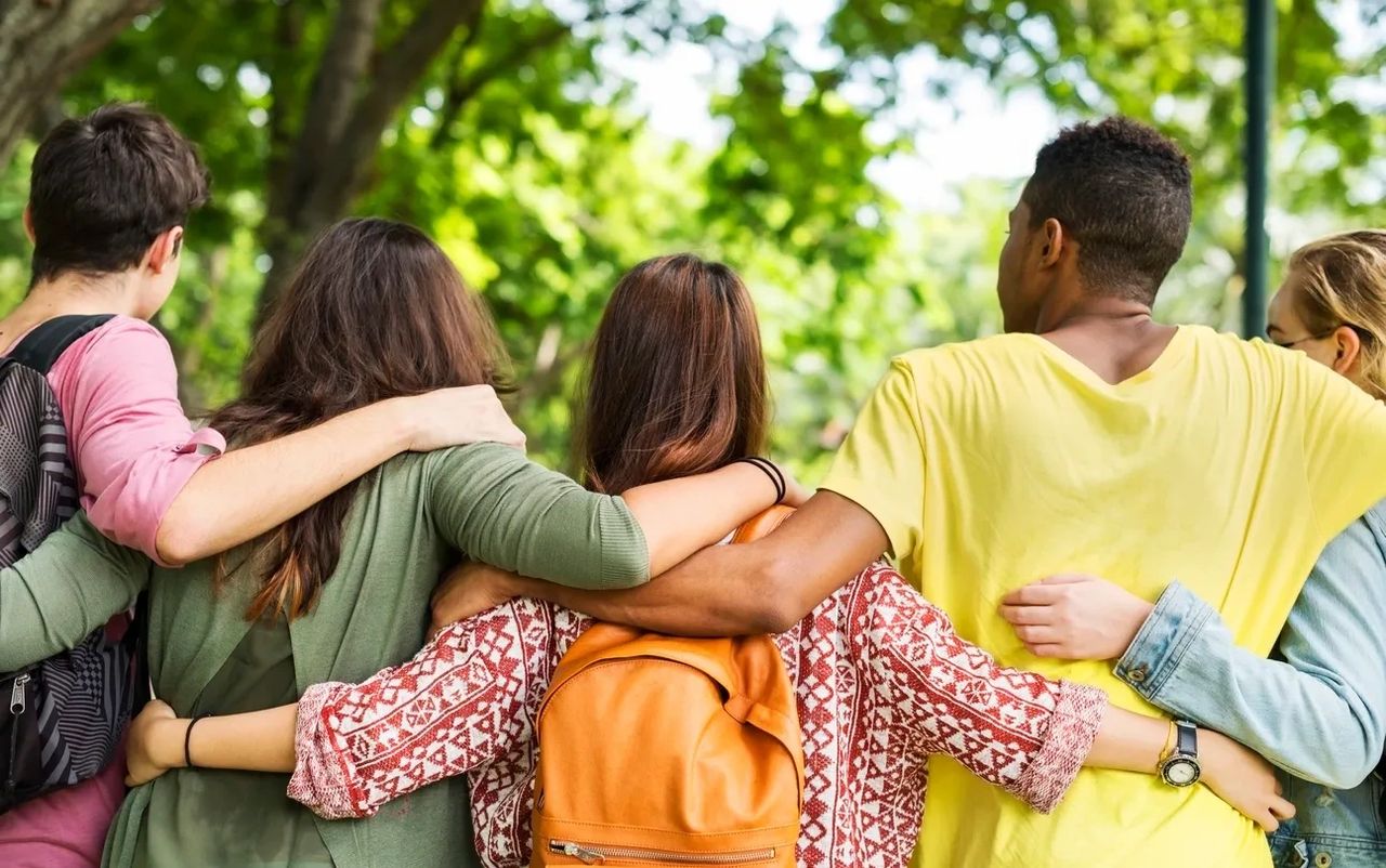 Several people hugging each other.  Represents the importance of connection to heal complex Post Traumatic Stress Disorder or C-PTSD