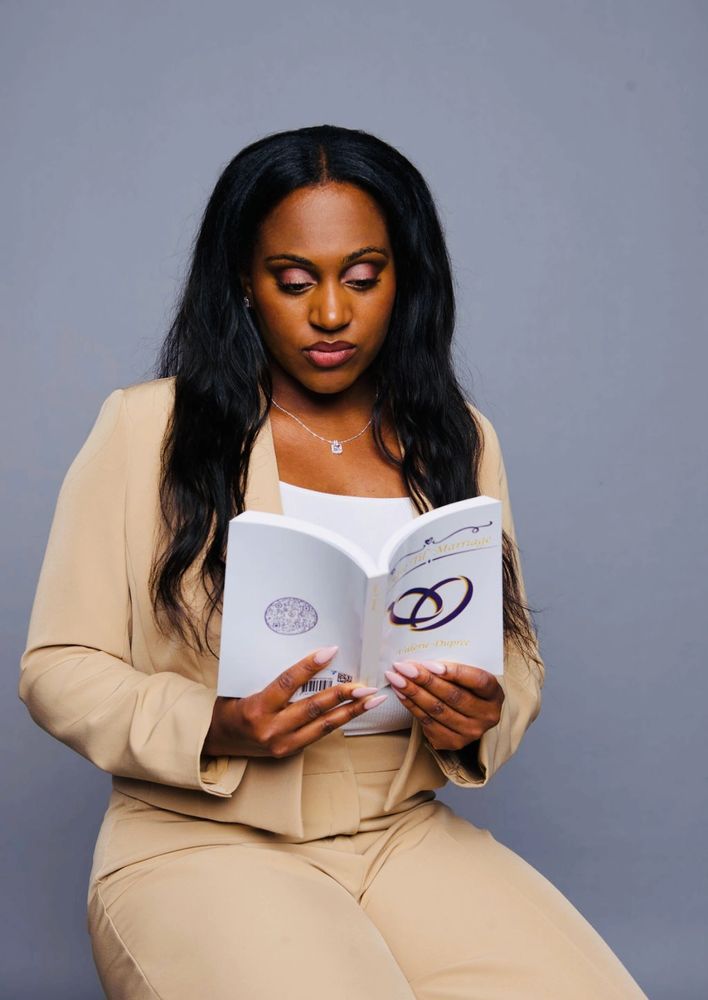 Middle-aged man in white shirt focused on his smartphone.
