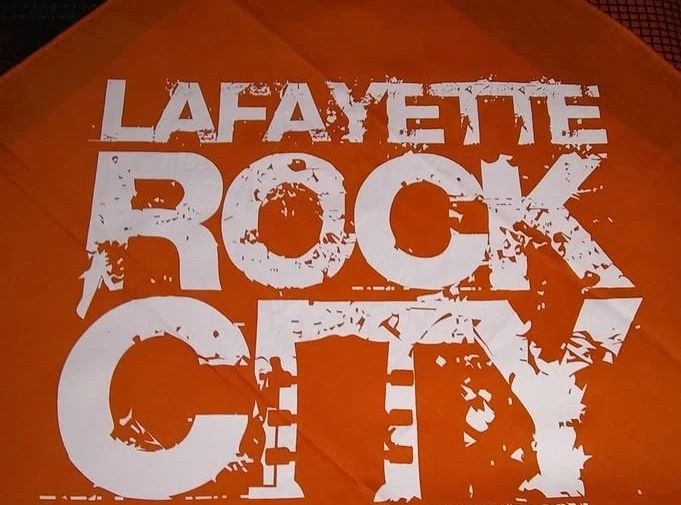 Orange fabric with distressed white text 'Lafayette Rock City'.