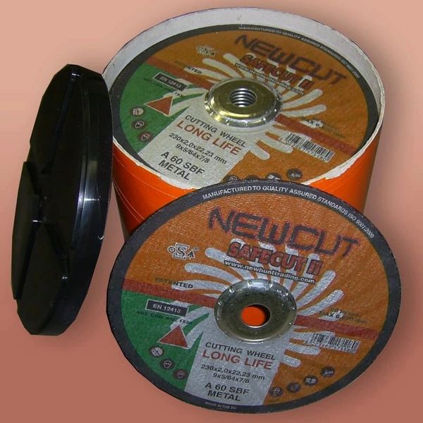 Two metal cutting wheels labeled "NEW CUT Safecut II."