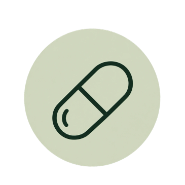 Icon of a capsule pill inside a green circle.