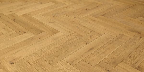 Light wooden floor with herringbone pattern.