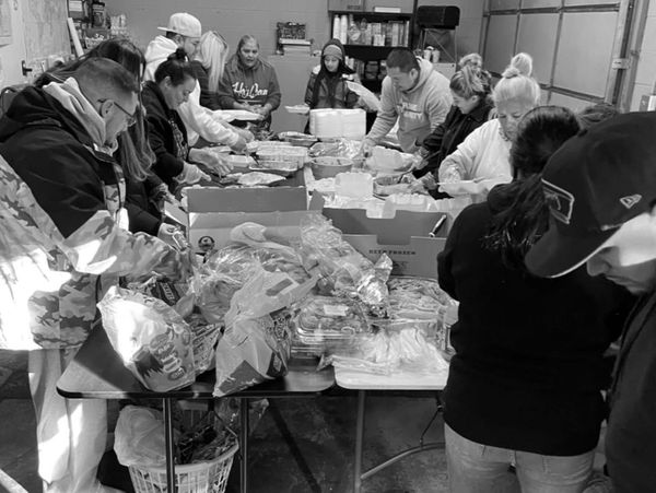 Our team getting ready to give out plates for Thanksgiving.