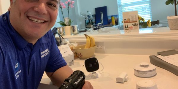 ADT camera and alarm hub installed by Premier Security technician in Port St. Lucie
