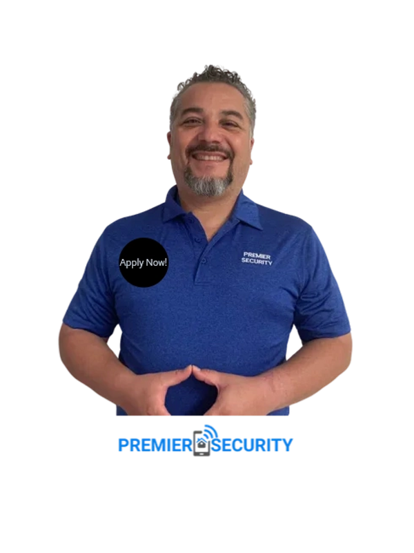 Premier Security technicians reviewing ADT plans in Treasure Coast office