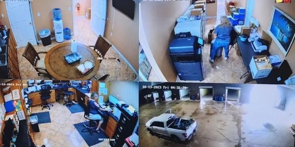 ADT technician installing security camera in Treasure Coast office