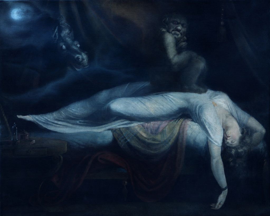 A woman lies limp on a bed with a dark creature perched on her chest under a full moon.