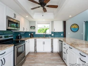 Sabal Sands- Complete kitchen remodel, white shaker style with beachy accents