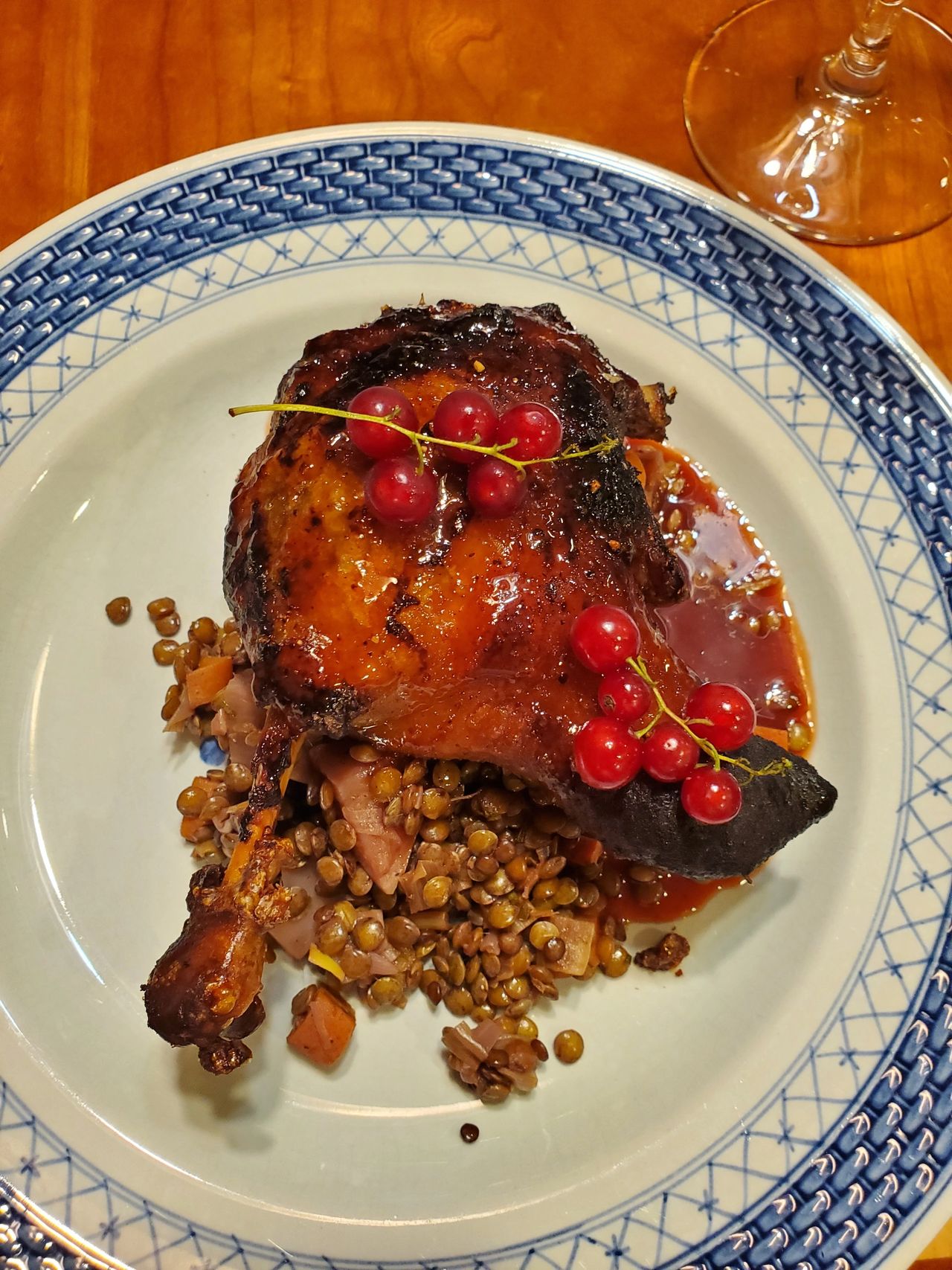 Baharat Duck Confit with Red Currant Gastrique and Port Lentils