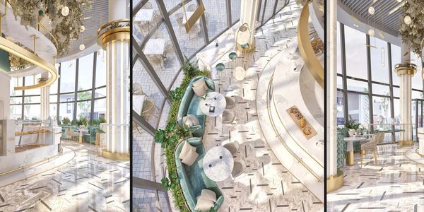 Luxurious, bright café interior with marble floors and gold accents.