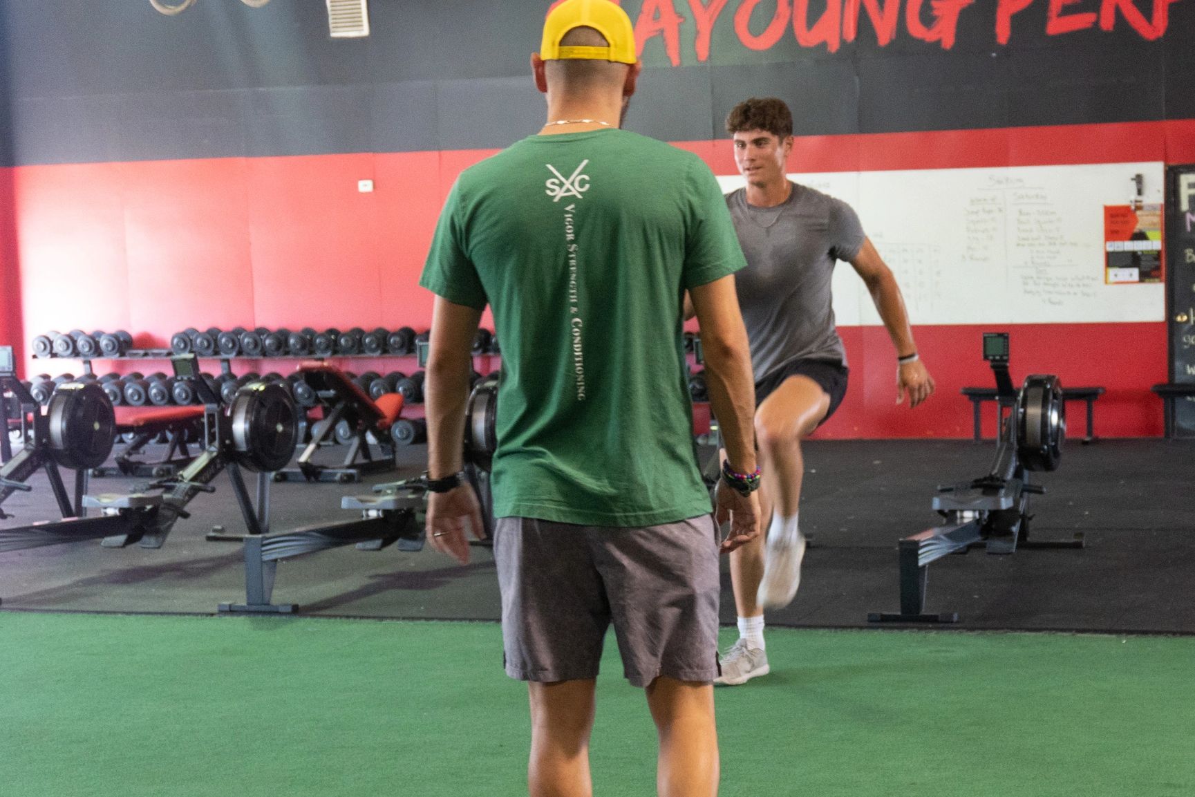 Coach watching Athlete perform agility and speed exercise