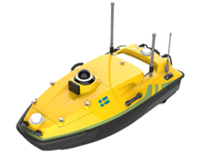 Small yellow remote-controlled boat with antennas and sensors.