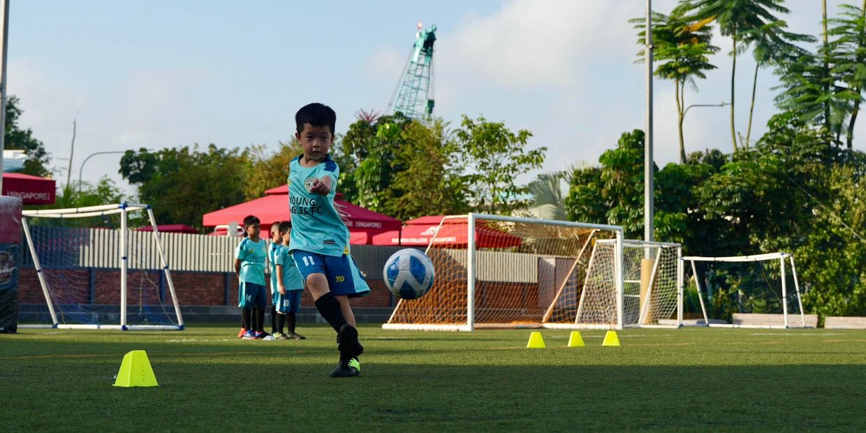 Young Eagles FC players perfecting their goal-scoring abilities through exciting shooting drills.