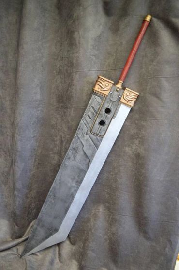 Large, stylized fantasy sword with a red handle.