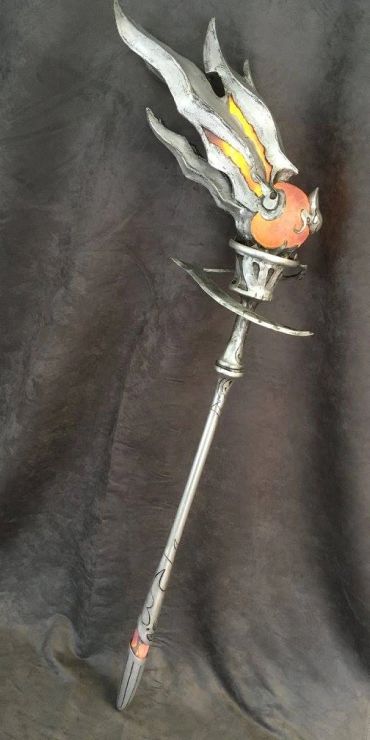 A detailed torch prop with flames and glowing core.