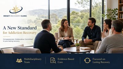 Reset Recovery Clinic: A diverse team of adult professionals and adult clients in a modern meeting r