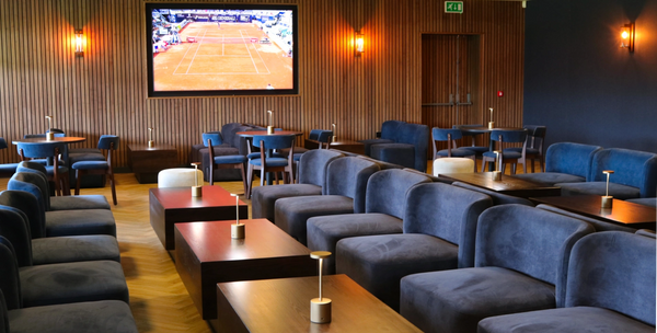 Another view of the other side of the Ferrar Bar, including TV