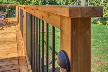 wood deck railing on cedar deck.