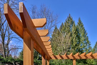 timber arbour or arbor built with western red cedar.