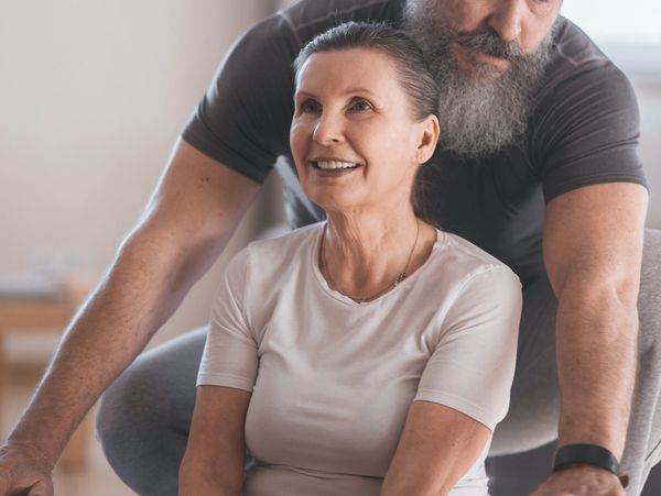 assisted stretching with a C-stretch coach