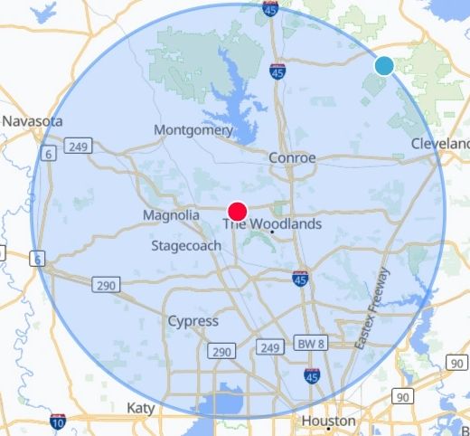 Map showing a blue radius around The Woodlands, Texas area.