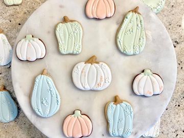 pastel colored sugar cookie pumpkins and gourds