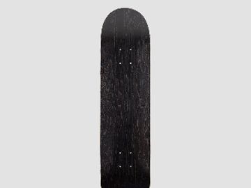 A plain black skateboard deck against a gray background.