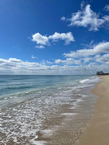 A view of the beach on a sunny day