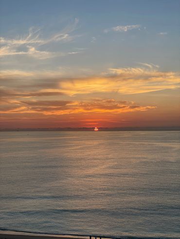 A view of sunset and the beach