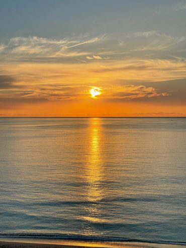 The sunset rays on the beach 