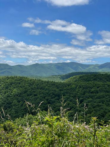 A scenery of beautiful hills and clear sky