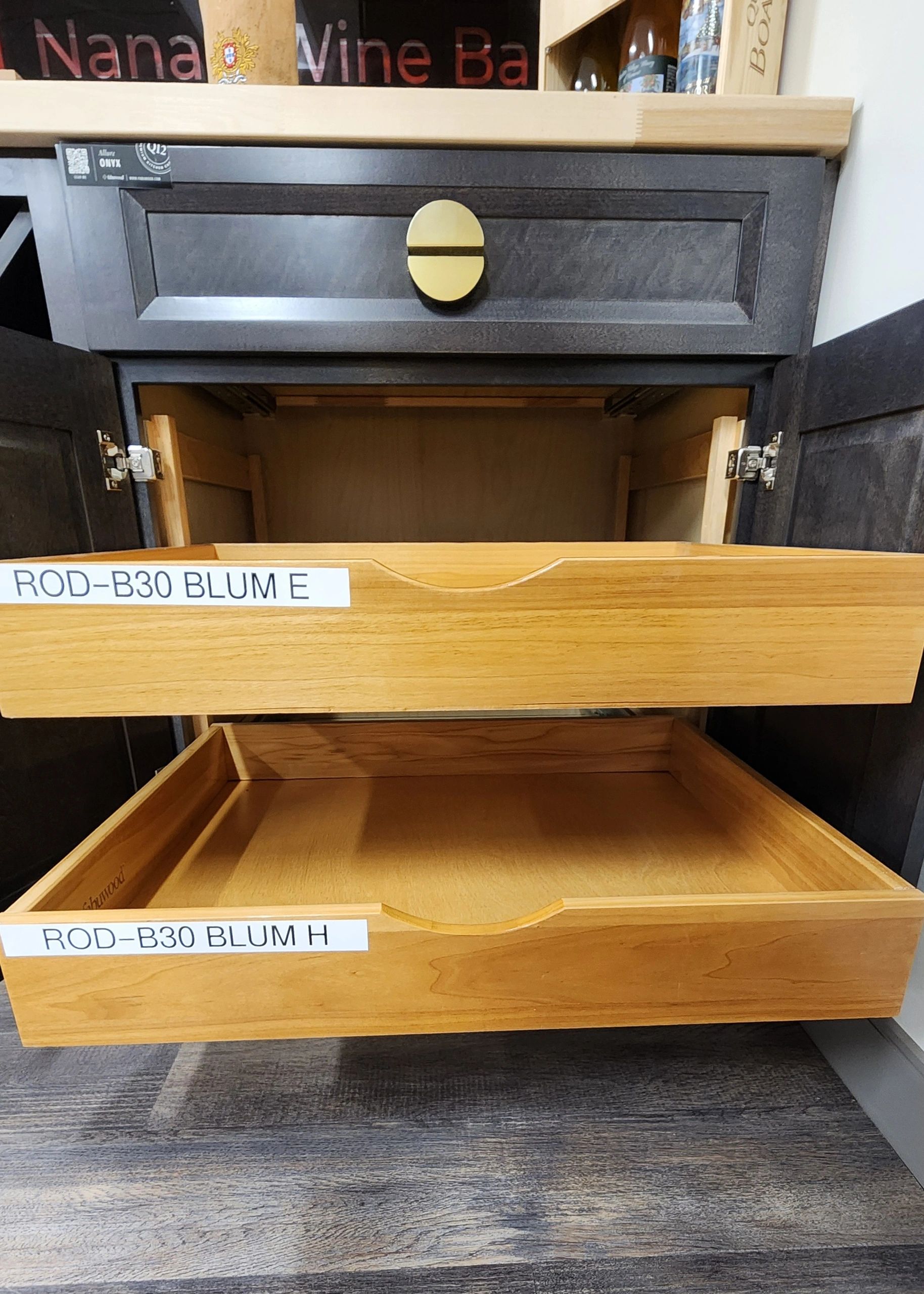 Open wooden drawers labeled ROD-B30 BLUM E and ROD-B30 BLUM H.