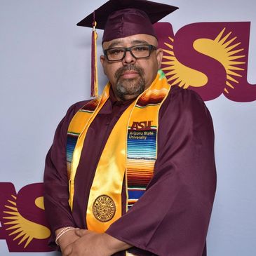 Tysonomo Multimedia Publisher Brian Cano Sr. in graduation attire from ASU’s Walter Cronkite School of Journalism and Mass Communication.