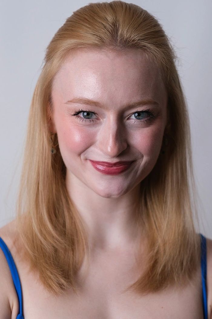 Kjerstin is pictured, Smiling woman with blue eyes and blonde hair in a blue top.