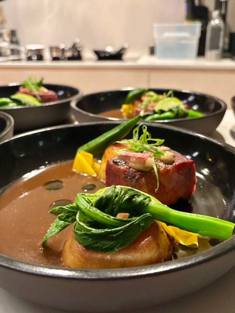 Dish of corned beef sinigang with gailan