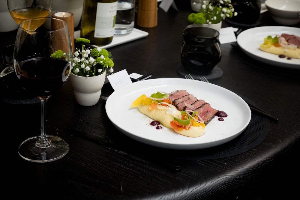 Dish of Striploin AAA steak with polenta tots, pickled and fermented surplus vegetables