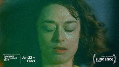 Close-up of a woman with closed eyes and wet face at Sundance Film Festival 2026.