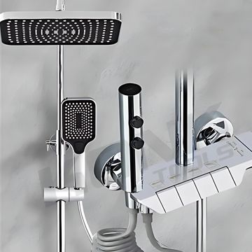 Modern chrome shower system with dual showerheads and sleek controls.