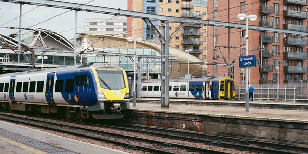 Rail sector project train in station similar to J52 Engineering Value Engineering project