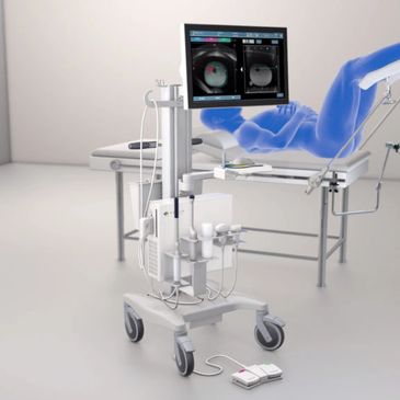Medical imaging device displaying internal scans of a patient lying on an examination table.