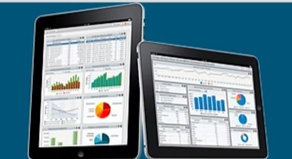 Two tablets displaying colorful business analytics dashboards with charts and graphs.