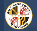 Seal of Baltimore County, Maryland with state flag elements.