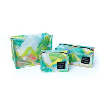 Three colorful rectangular pouches with artistic mountain designs.