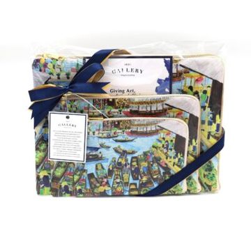 Gift set with art-themed designs and a navy ribbon.