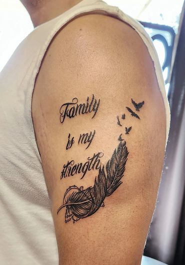 Feather and birds with "Family is my strength.